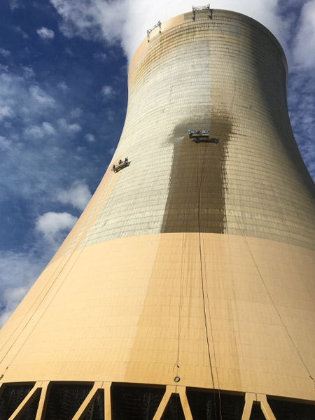 Ausvic applying protective coating on cooling tower